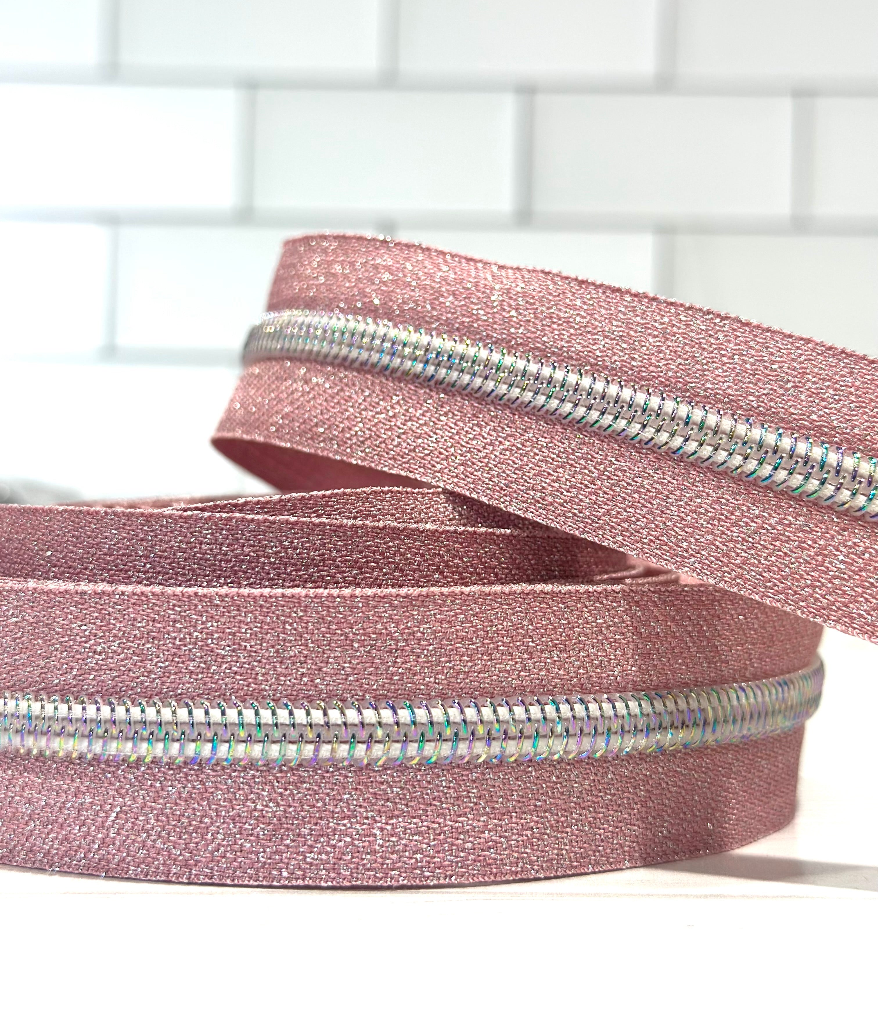 Pink Metallic Zipper Tape with White Iridescent Teeth