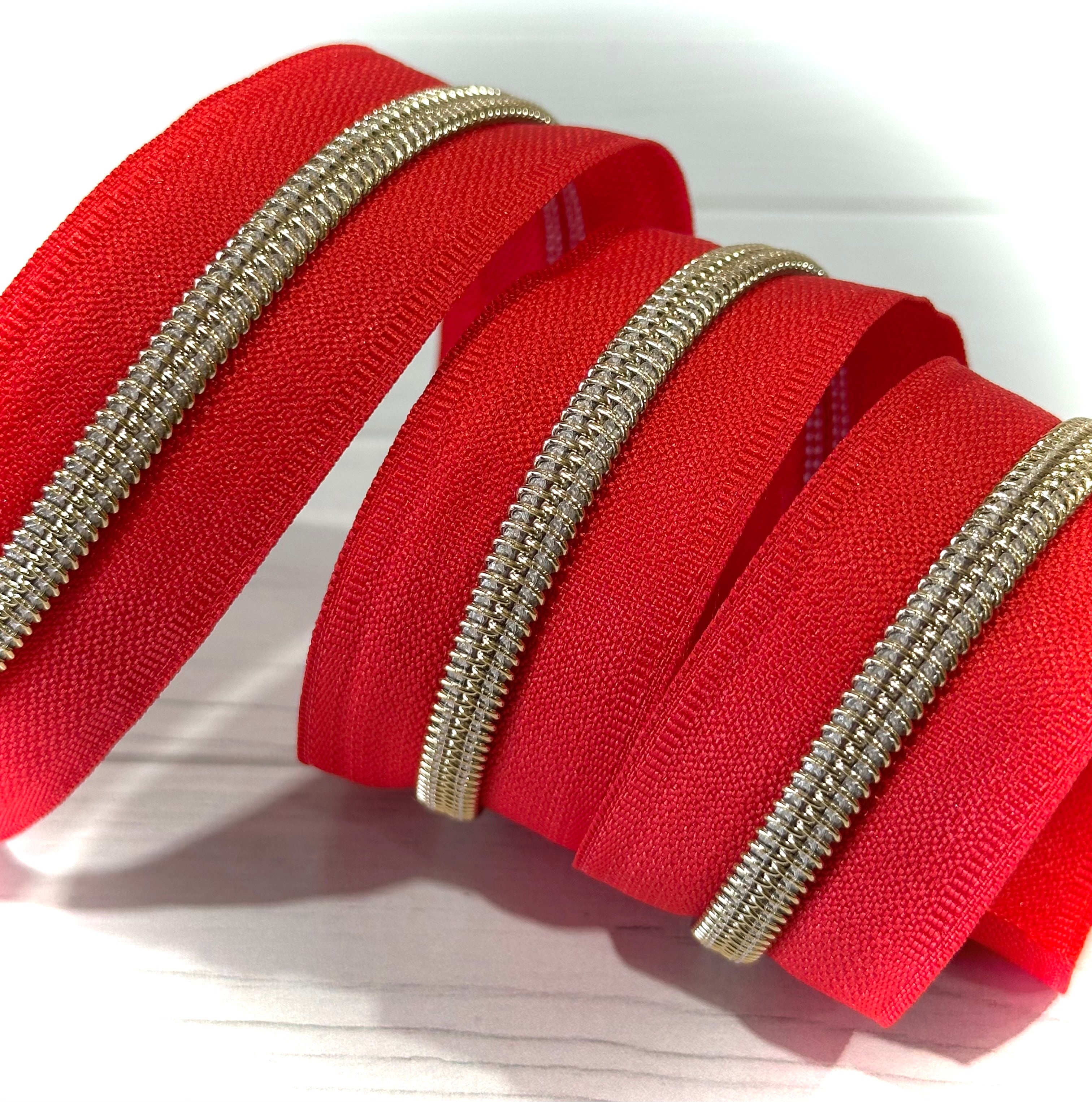 Red zipper tape with Gold teeth