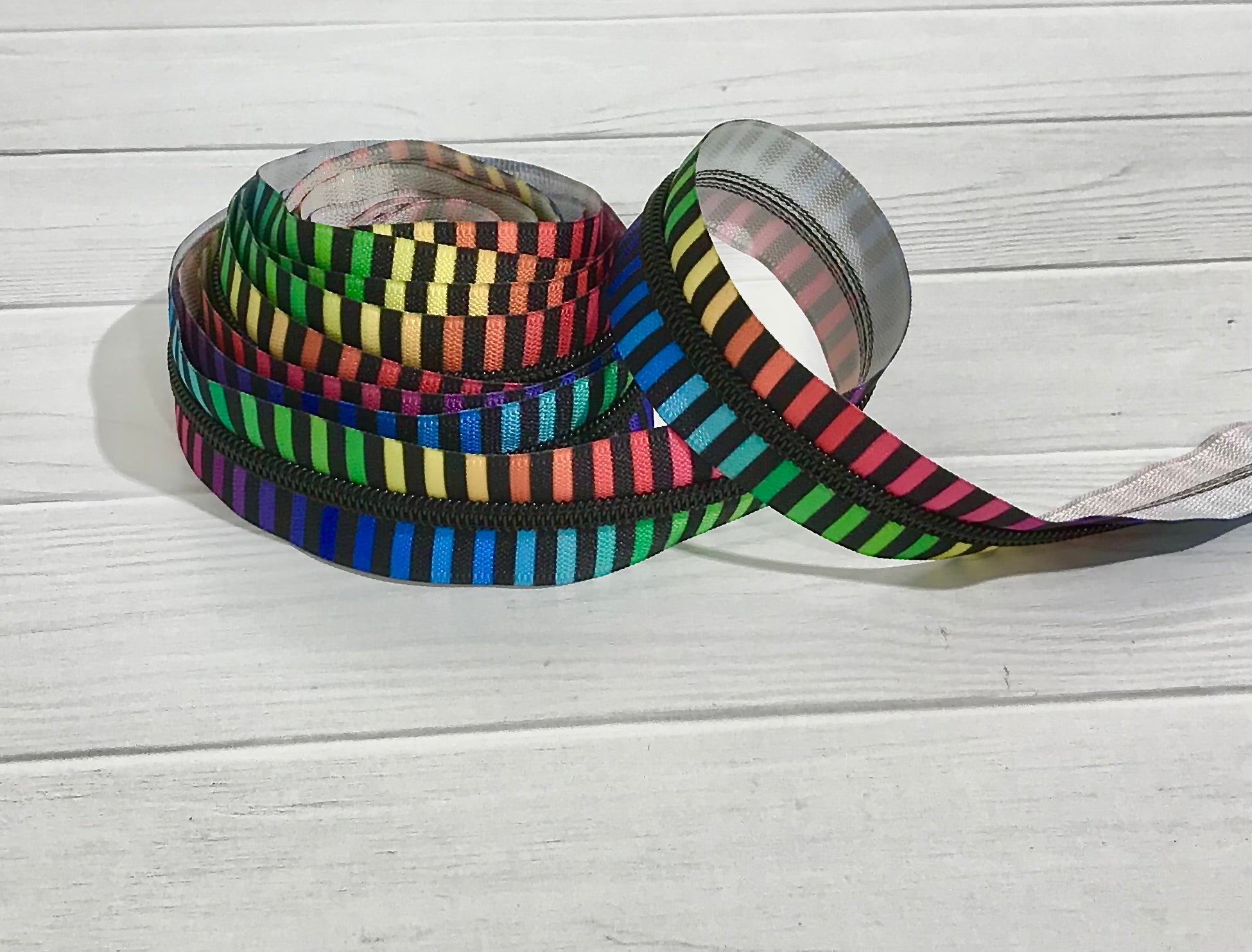 Horizontal Rainbow stripe with Black teeth zipper tape