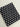 Black fabric with white polka dots on a light gray background