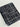 Black fabric with white geometric pattern on a light gray background
