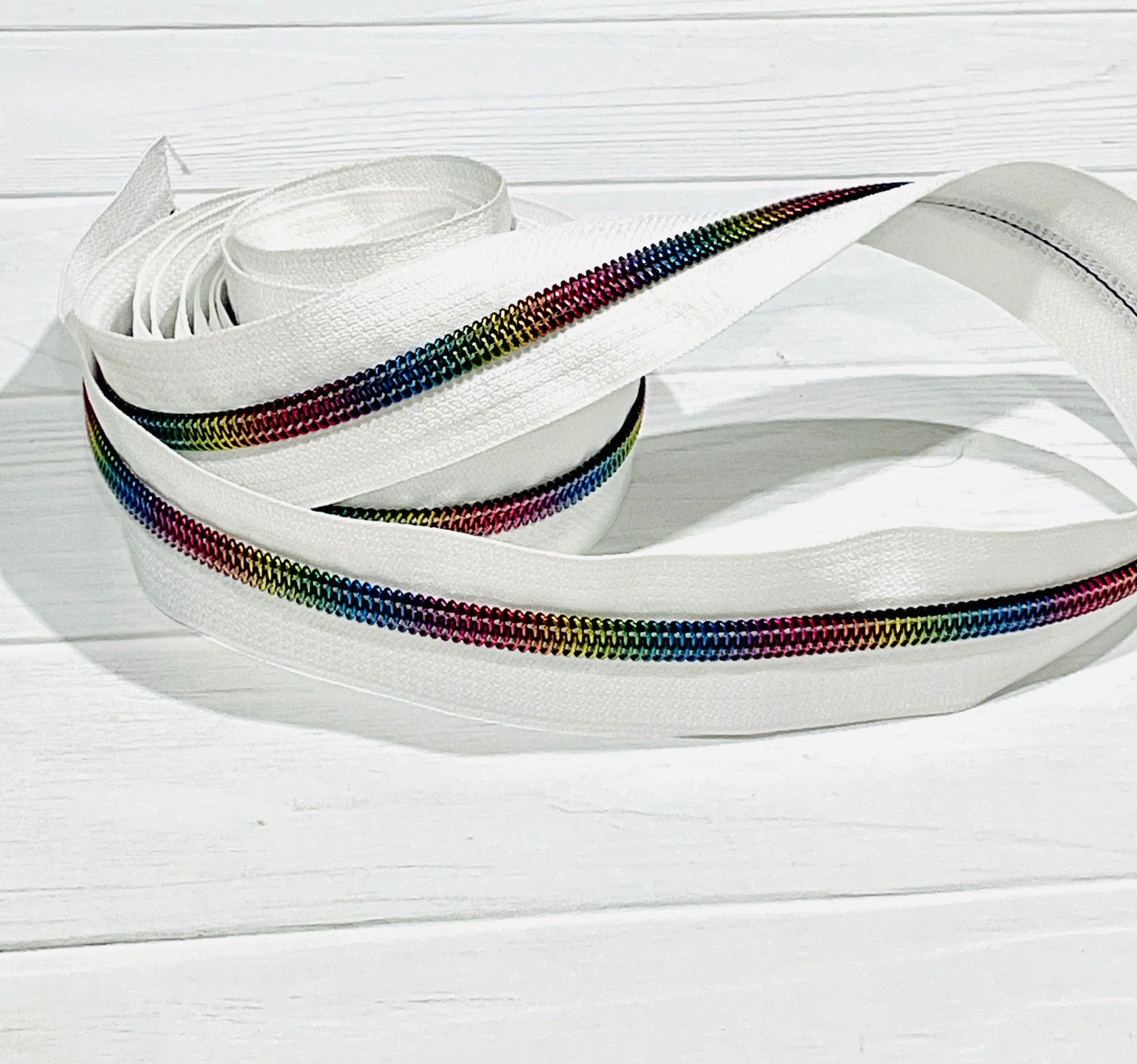 Metallic rainbow on White zipper tape