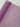 Roll of purple mesh fabric on a light gray background