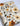 Floral fabric with brown and beige flowers on a white background