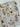 Fabric with bee and floral pattern on a white background