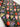 Colorful butterfly and flower pattern on a dark background