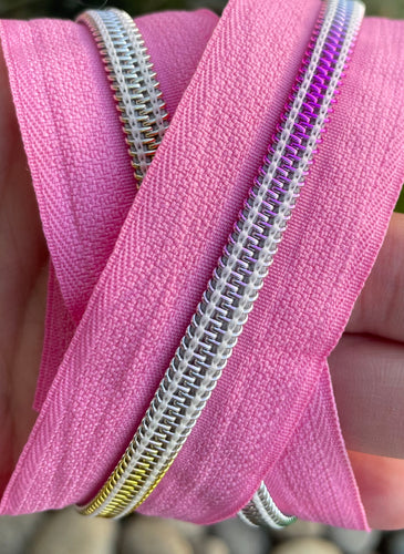 Pink with silver variegated teeth zipper tape