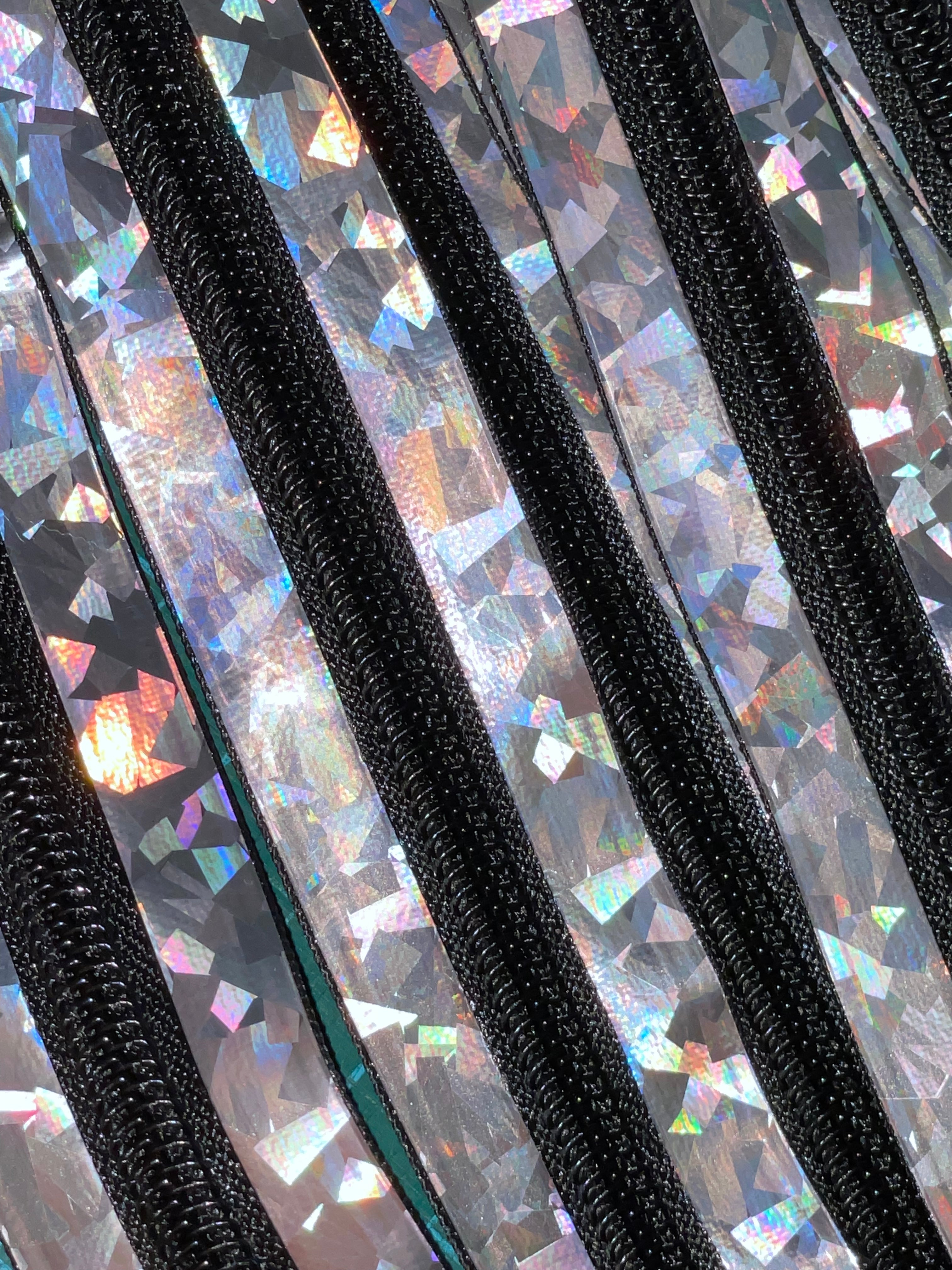 Fractured Holographic with black teeth zipper tape