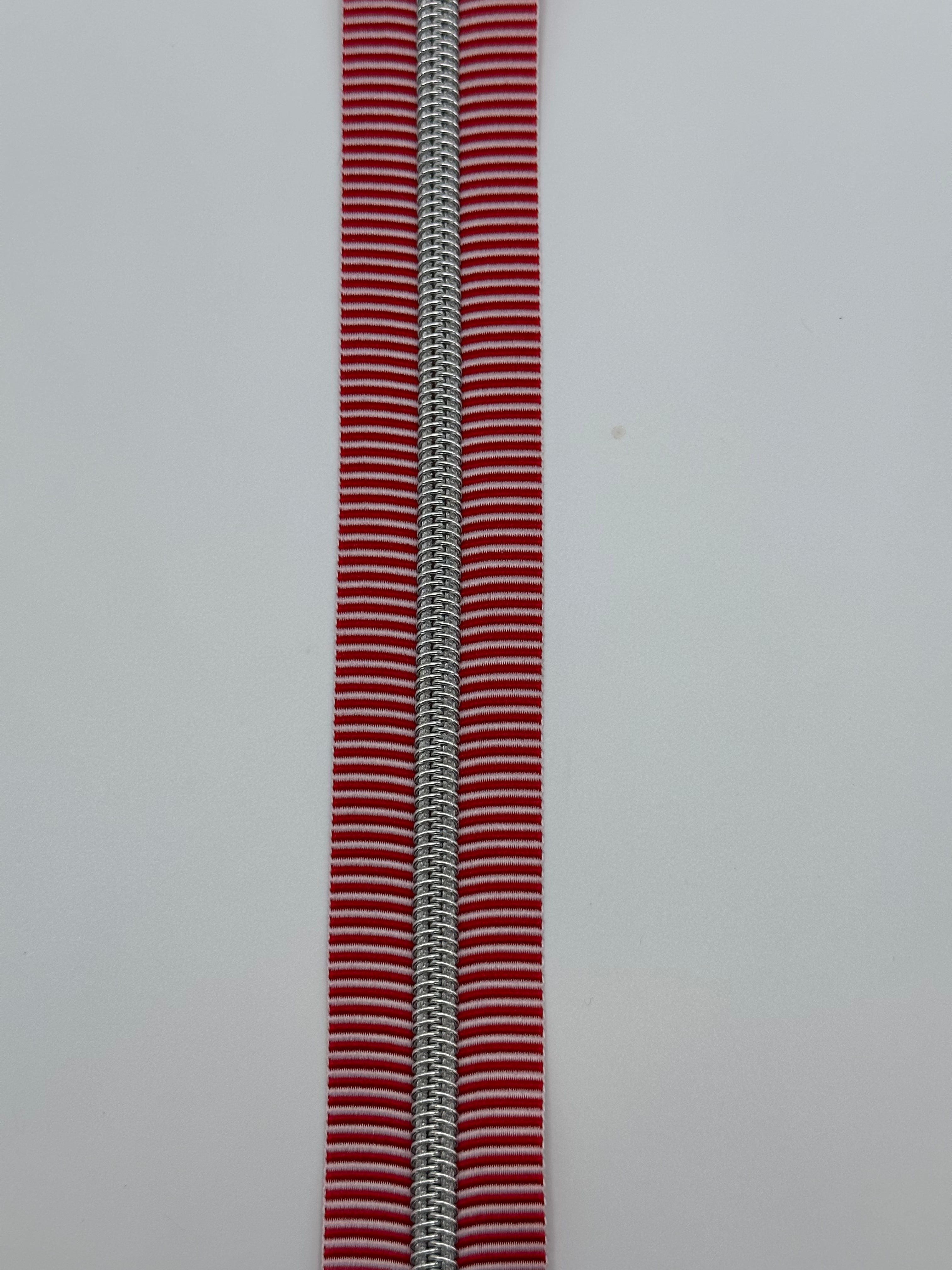 Red and white stripe with silver teeth Zipper Tape