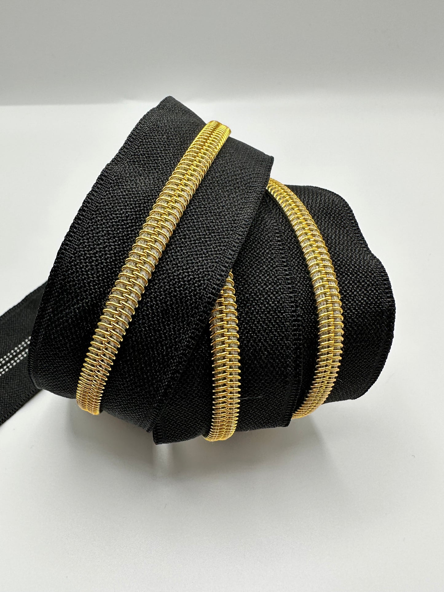 Gold teeth on Black zipper tape