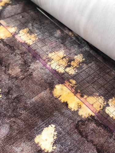 Wine and Rust acid wash faux denim